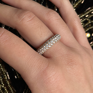 Radiance white gold and diamond wheel ring on finger
